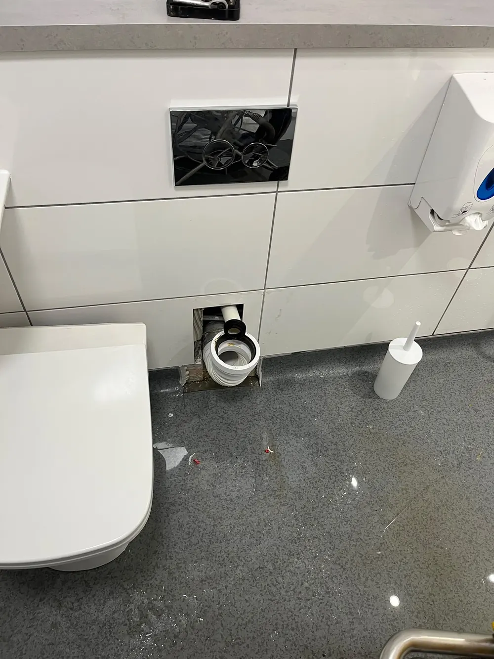 Toilet waste pipe repair access