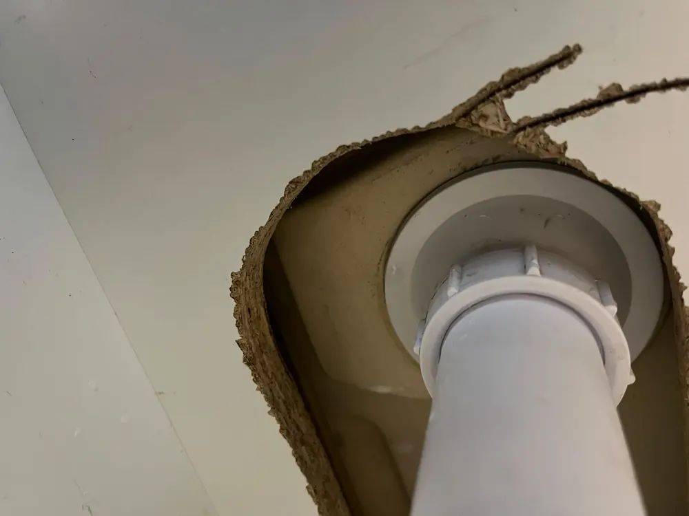 Close up of repaired waste pipe fitting